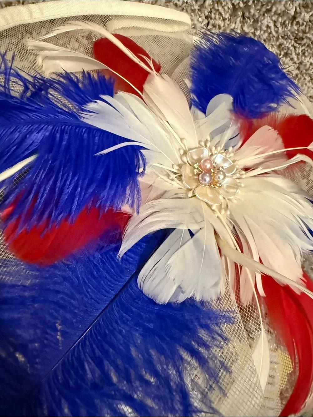 White Fascinator Headpiece with Red & Blue Feather Accents